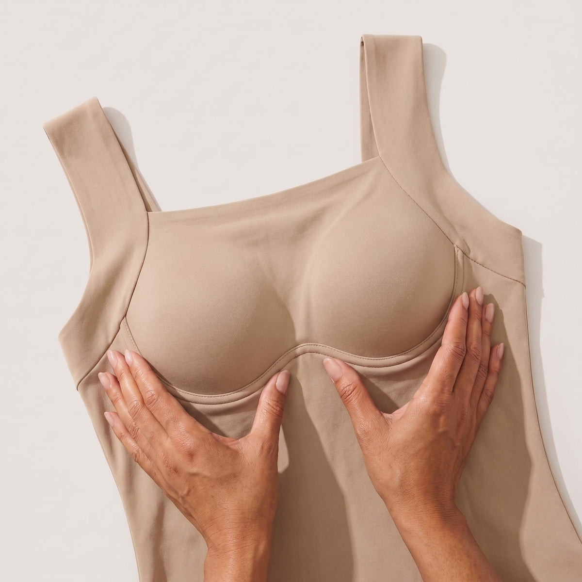 Close up detail of built in molded cups on The Ease Comfort seamless bra tank top for wirefree support